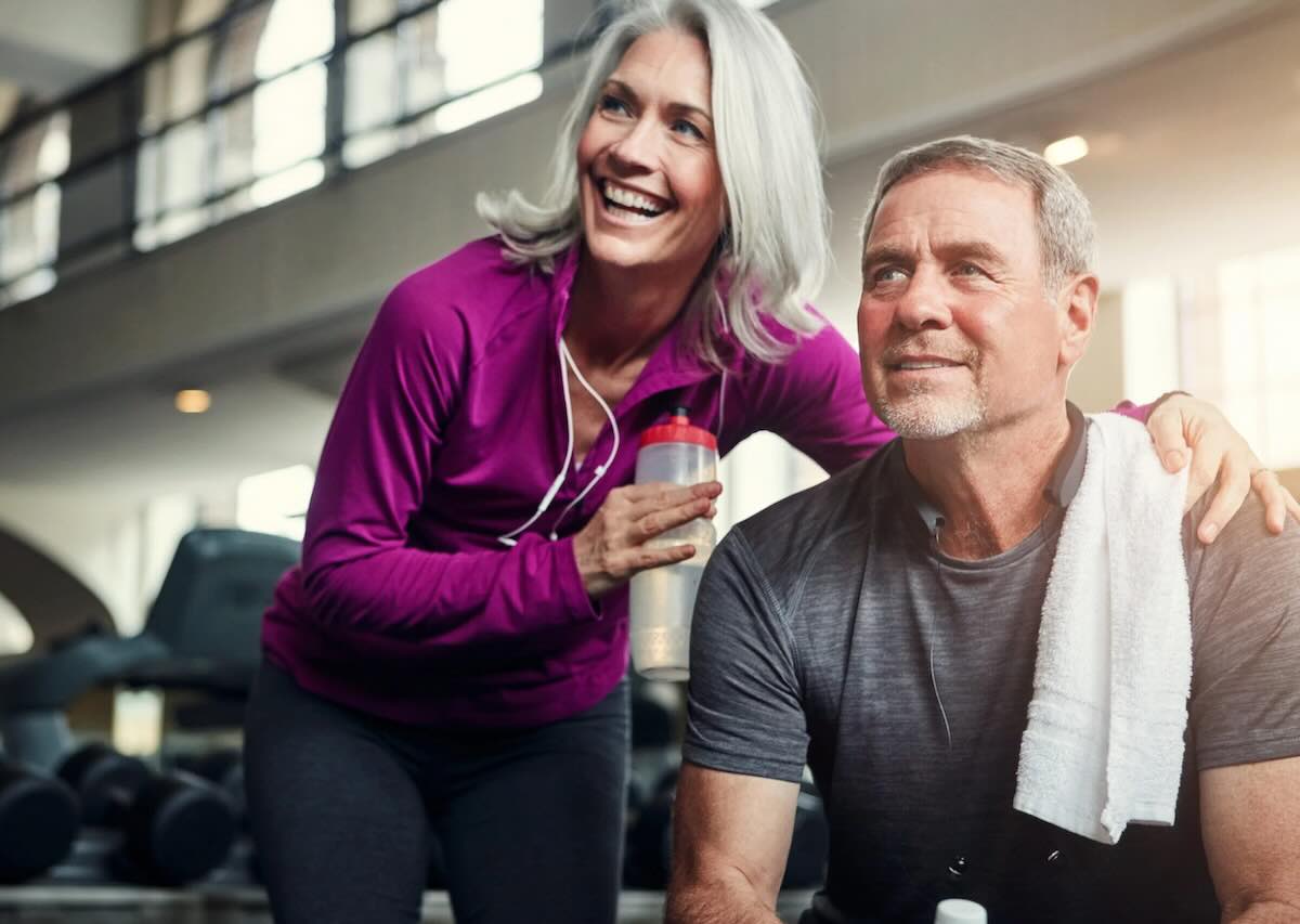 Balanced Hormone Health – February 2026 Blog Images – How-Semaglutide-Supports-Weight-Loss-Without-Extreme-Dieting Active older couple smiling together at the gym after a workout.