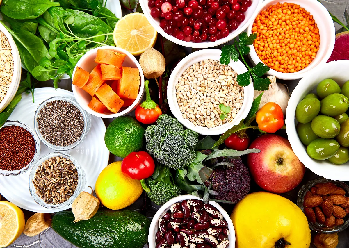 Healthy whole foods and high-protein ingredients supporting protein for hormones, energy, and weight loss during National Nutrition Month.